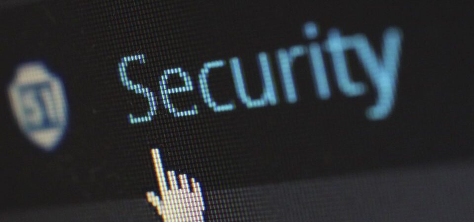 Cursor hovering over the word 'Security' on a digital screen.
